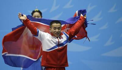North Korean Om Yun-Chol breaks weightlifting world record at Asian Games