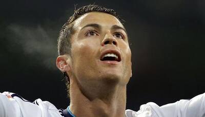 Ronaldo leads eight-goal rout of Deportivo, Atletico held