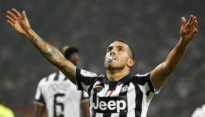 Carlos Tevez on target again as Juventus stun Milan