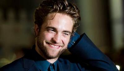 Robert Pattinson 'falls hard' for new love
