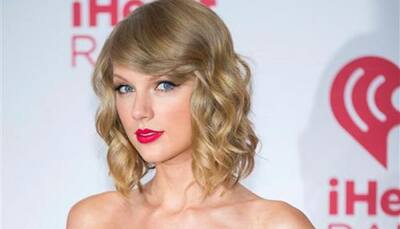 Taylor Swift gets realistic, happy being single