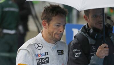 McLaren boss says Jenson Button not racing for place in 2015 team