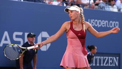 Wozniacki outlasts erratic Sharapova; Agnieszk​a Radwanska wins