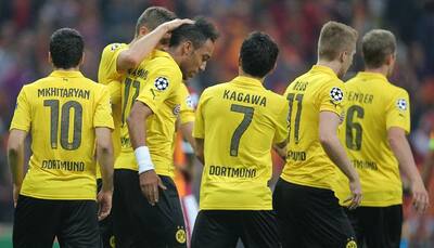 Aubameyang double maintains Dortmund`s perfect record