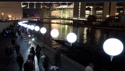 White luminous balloons mark Silver Jubilee of fall of Berlin Wall