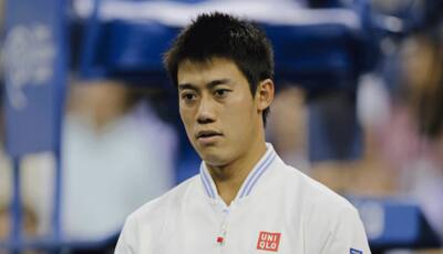 Kei Nishikori beats stand-in David Ferrer, now must wait