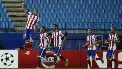 Mario Mandzukic hat-trick eases Atletico Madrid into last 16