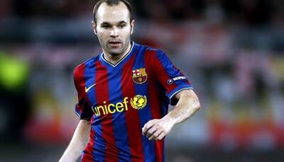 Barcelona lifted by Andres Iniesta return before derby