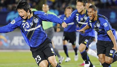 Gamba Osaka made to sweat for J-League title