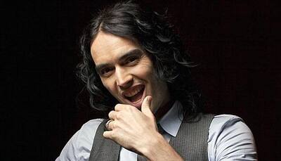Russell Brand faces Twitter ban after posting journo's deatils