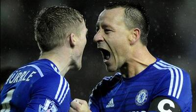 Chelsea go three clear after easing to win at Stoke