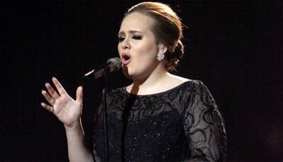 Simon and I are very much together: Adele on break-up rumours