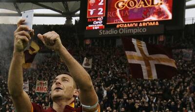 Francesco Totti celebrates Rome derby double with `selfie`
