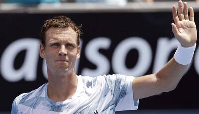 Tomas Berdych powers into Open fourth round