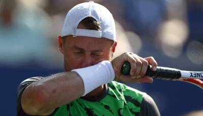 Lleyton Hewitt to play on, groomed as Davis Cup captain