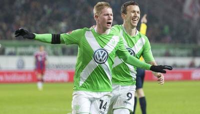 Wolfsburg end Bayern Munich's unbeaten run to revive title race