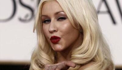 Christina Aguilera debuts baby's picture