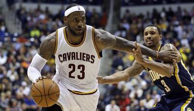  James leads Cavaliers in rout of Wizards 