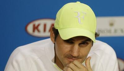 Roger Federer enjoyed champagne after Australian Open defeat