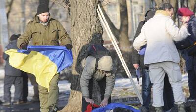 Blast hits march in eastern Ukraine, two killed