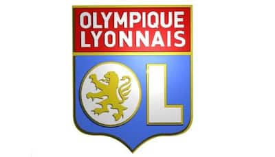Lyon grind out win to reclaim top spot in France