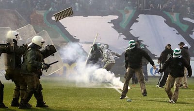 Greek football championship suspended after violence