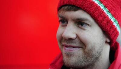 New boy Sebastian Vettel plays down Ferrari hopes in Melbourne
