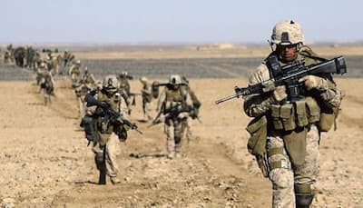 US to slow Afghan withdrawal, keep current 9,800 troops to year end