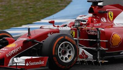 Vettel, Raikkonen delight at Ferrari progress
