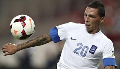 Greek football federation backs injured Jose Holebas