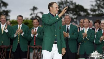 Jordan Spieth takes first major with historic Masters win
