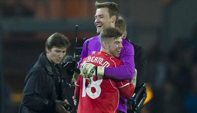 No separating top four and FA Cup for Simon Mignolet