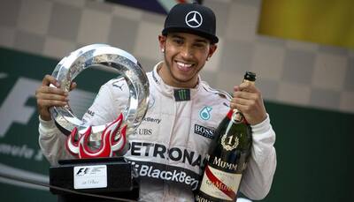Lewis Hamilton loving the life of a champion