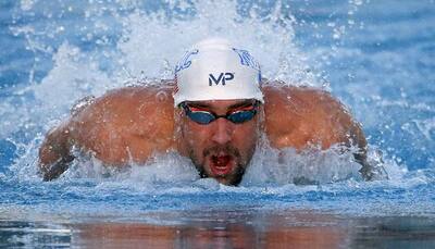 Michael Phelps caps comeback meet with storming 100m freestyle win