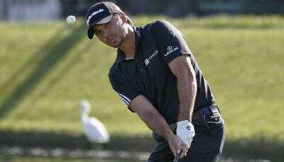 Jason Day, Erik Compton share lead at weather-hit Zurich Classic