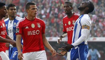Coaches clash after Porto draw edges Benfica towards title
