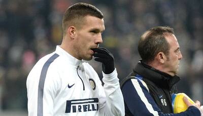 Lukas Podolski breaks duck in style as Inter Milan beat nine-man Udinese