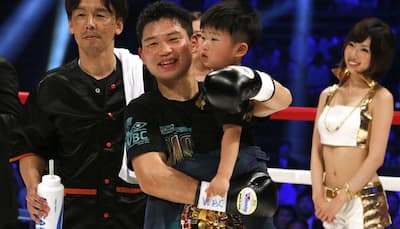 Japan`s Takashi Miura flattens Billy Dib to retain world title