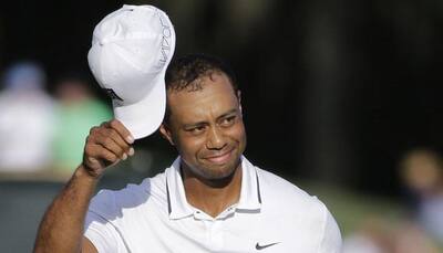 Tiger Woods delivers highlight shot in opening round