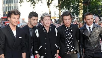 One Direction to make first award show appearance as four-piece