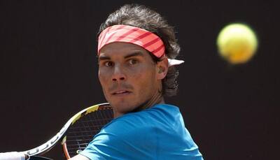 ''Almost perfect'' Rafael Nadal cruises past John Isner into Rome quarters