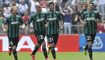 Domenico Berardi hat-trick sinks angry nine-man AC Milan