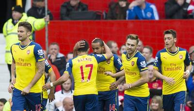 Theo Walcott urges Arsenal to seal top-three finish