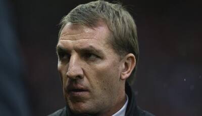Brendan Rodgers faces anxious wait to discover fate after Liverpool thrashing