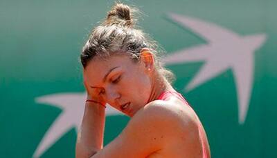 Third seed Simona Halep knocked out of French Open