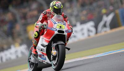 Andrea Iannone takes pole for Italian MotoGP