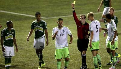 Clint Dempsey awaits fate after ripping up ref`s book 