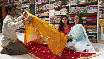 Saris with small prints, slim borders lend slim look