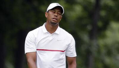 Tiger Woods touts progress as new romance reported