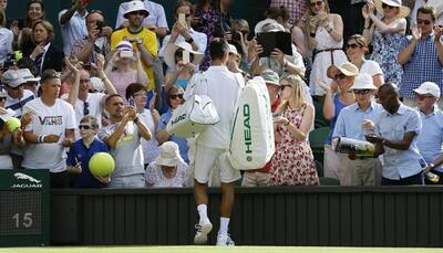 Leg to differ! Novak Djokovic autographs fan`s prosthetic